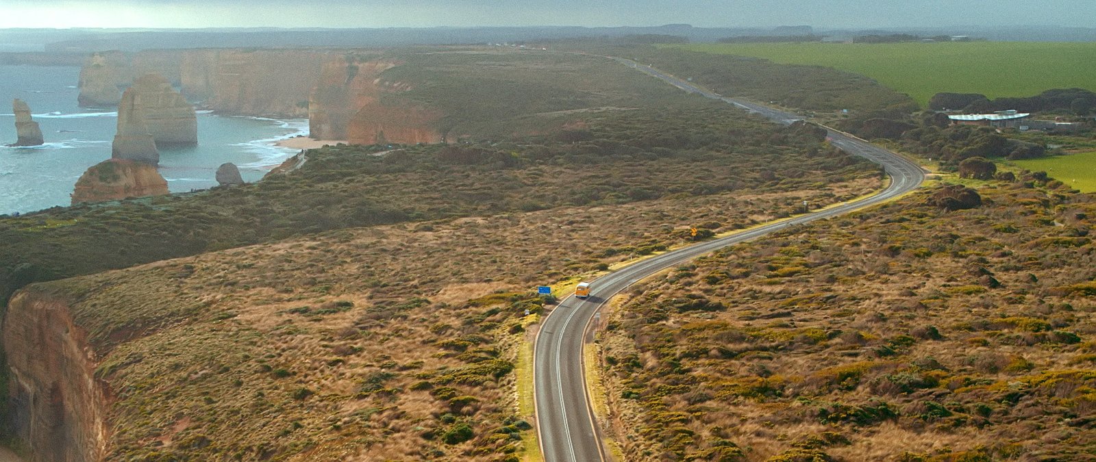 A Kombi on the Great Ocean Road above the Twelve Apostles